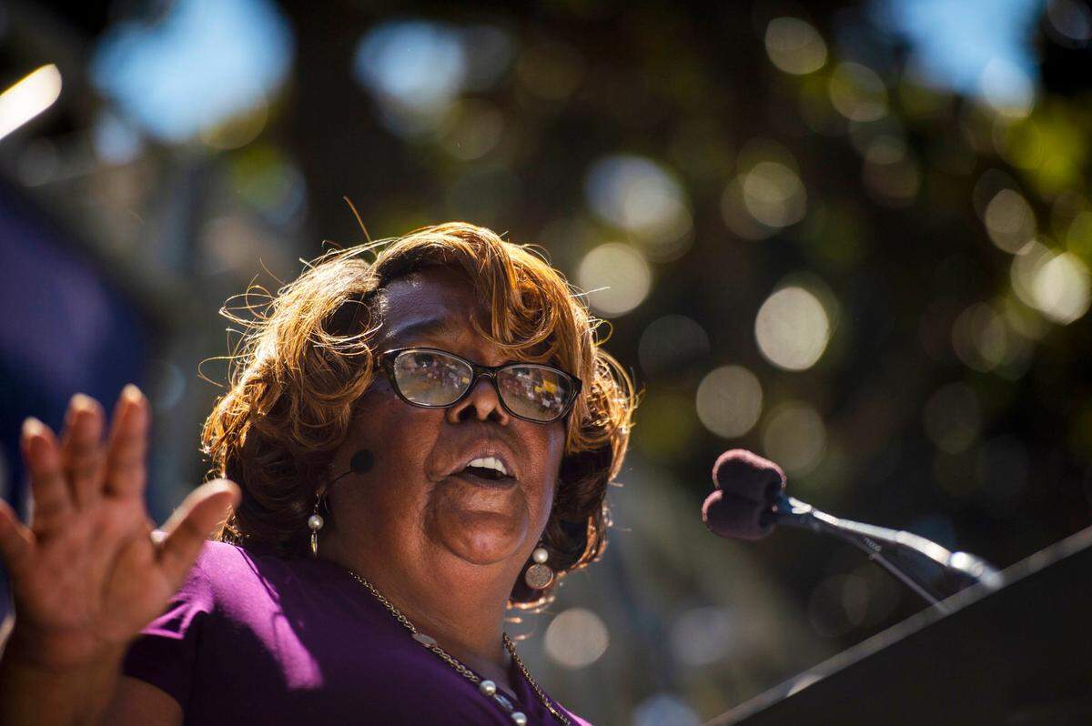 Yvonne Walker, the previous president of SEIU Local 1000, stands on a stage to speak to her constituents during a rally at the state Capitol in August 2019.