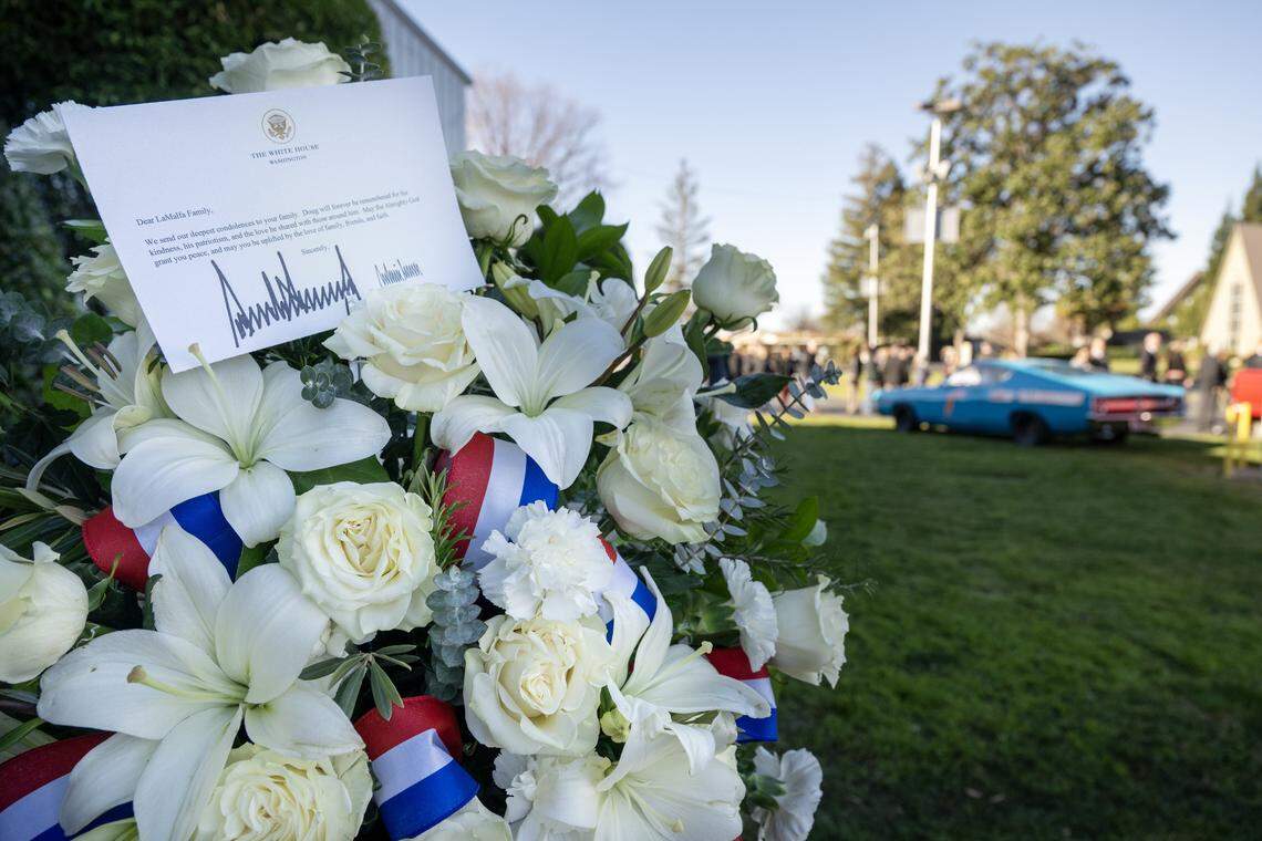 Flowers from President Donald Trump displayed outside the auxiliary building before the memorial service for Rep. Doug LaMalfa at the Silver Dollar Fairgrounds in Chico on Saturday.