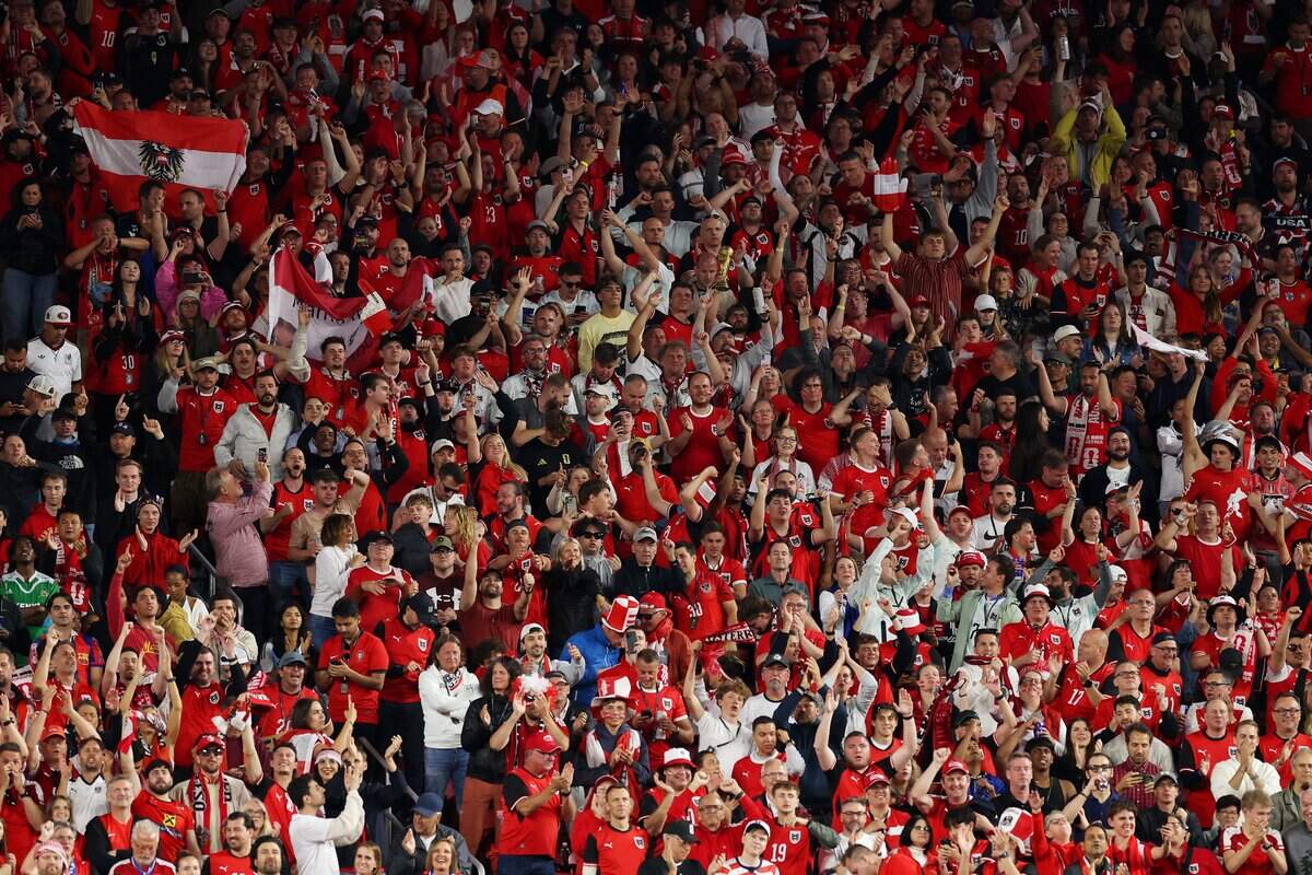 SANTA CLARA, CALIFORNIA - JUNE 16: Fans of Austria celebrates the team's second goal during the FIFA World Cup 2026 Group J match between Austria and Jordan at San Francisco Bay Area Stadium on June 16, 2026 in Santa Clara, California. (Photo by Richard Heathcote/Getty Images)
