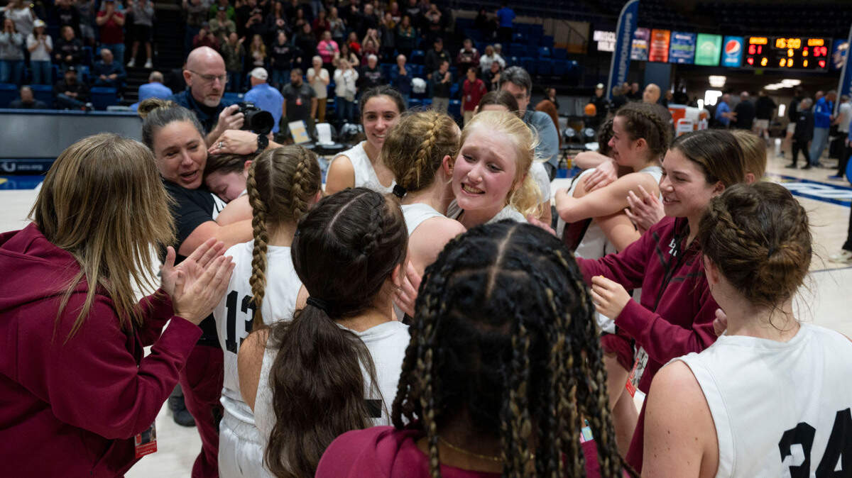 Bear River High School players react after beating Valley Christian Academy during the CIF Sac-Joaquin Section Division V girls basketball championship game Friday at UC Davis.