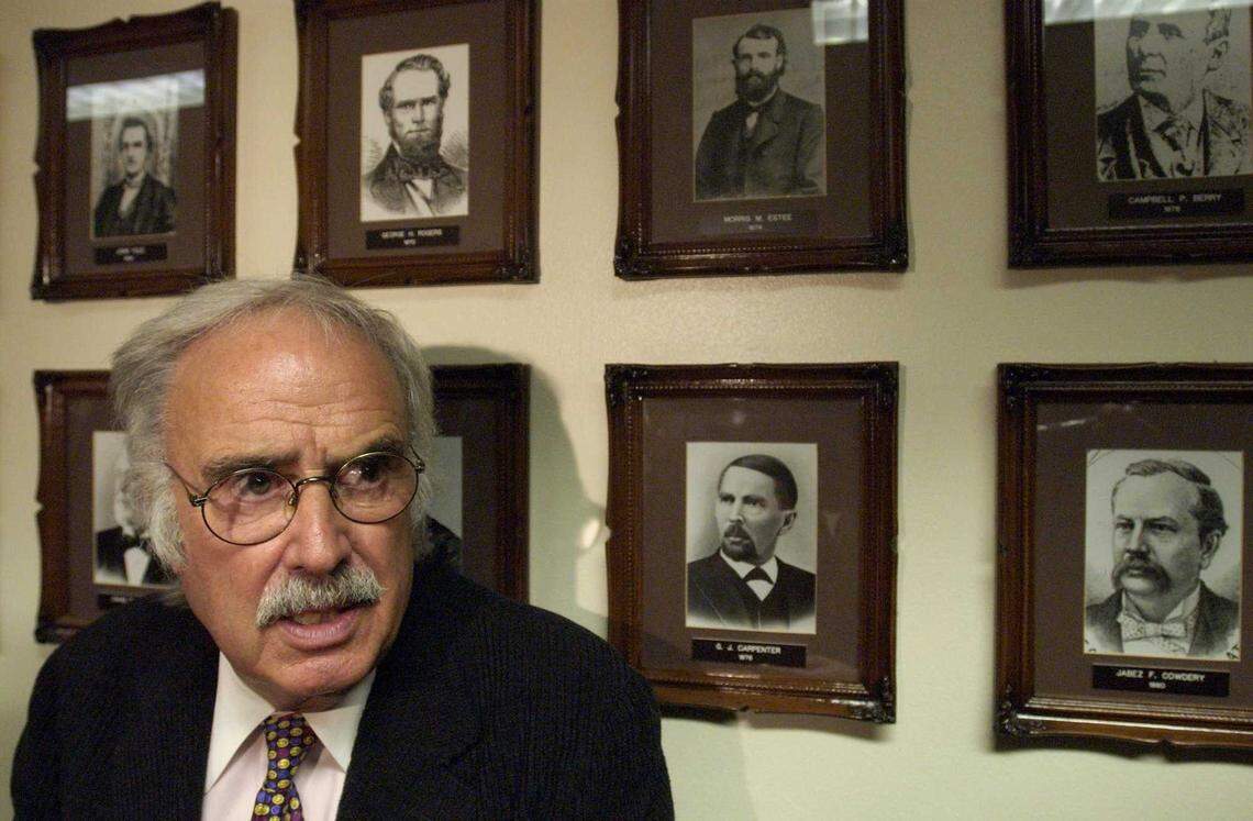 Senate President Pro Tem John Burton talks to reporters outside the Assembly chambers at the state Capitol on 2003. Burton, a former chair of the California Democratic Party who died in 2025, is being inducted into the California Hall of Fame.