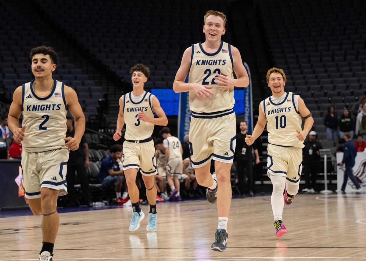 The Stone Ridge Christian Knights’ Jaiden Sahota (2), Cooper Trost (3), Tyler Mccabe (22) and Owen Nelson (10) prepare for their final play in their win over Sacramento Waldorf during a CIF Sac-Joaquin Section Division VI boys basketball championship game at Golden 1 Center on Thursday, Feb. 27, 2025.