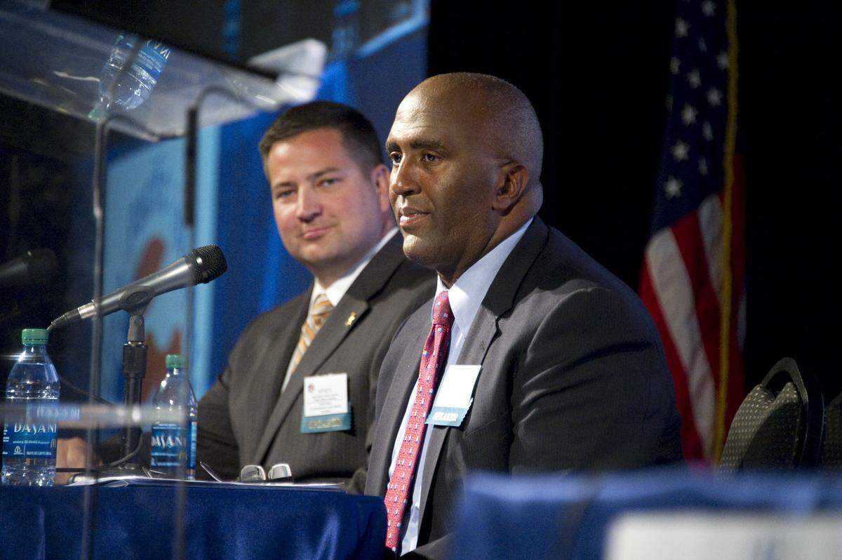 Scott Jones, left, and Jim Cooper appear at a candidates forum at Sacramento State during their race for the Sacramento County Sheriff’s position in 2010. Twelve years later, Cooper will succeed Jones.