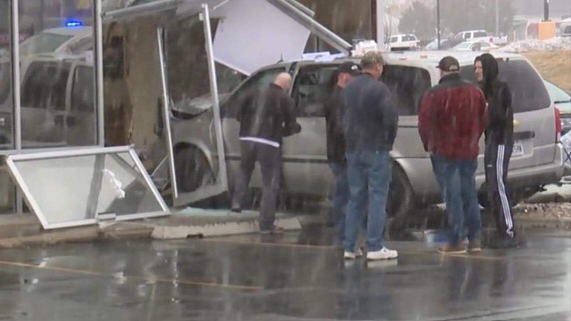 Roseann Davis, 51, was killed after a minivan drove across a curb and into an office building, officials said.