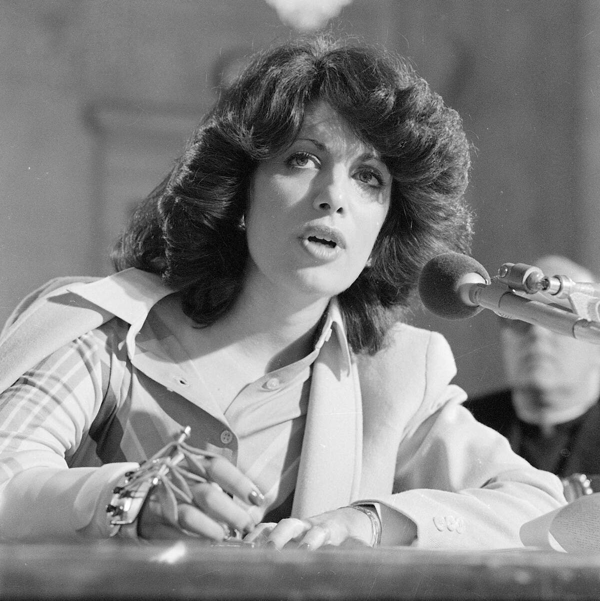 Jackie Speier, former legislative aide to slain Rep. Leo Ryan, D-Calif., testifies before an unofficial congressional hearing on the cult phenomena Monday in Washington, February 5, 1979. Speier still wears a type of brace on her right hand as she continues her recovery from injuries sustained during her escape from Guyana.