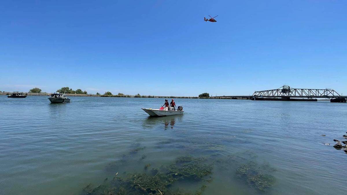 Search and rescue crews with multiple agencies search the Delta near the Mokelumne River Bridge for a victim who reportedly fell into water without a life jacket on Sunday, May 16, 2021.