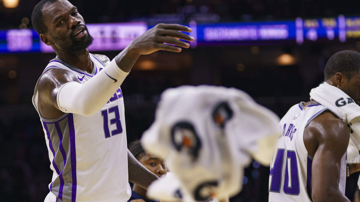 Sacramento Kings’ Dewayne Dedmon tosses a towel during the second half of a game against the 76ers on Nov. 27.