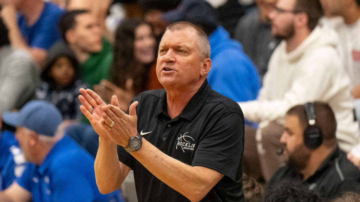 Rocklin Thunder coach Steve Taylor claps for his team as they face the Sheldon Huskies in a 2024 CIF Sac-Joaquin Section boys basketball Division I quarterfinal game. Taylor this week retired as a head coach, a year after retiring as a teacher at Rocklin High.