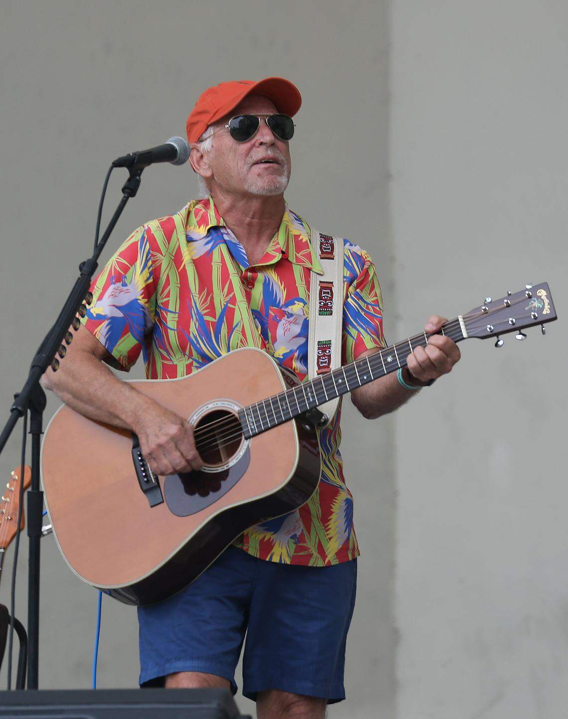 WEST PALM BEACH, FLORIDA - NOVEMBER 03: Jimmy Buffett plays a song as he performs at a Get Out the Vote rally for U.S. Senator Bill Nelson (D-FL) and Florida Democratic governor candidate Andrew Gillum at the Meyer Amphitheatre on November 03, 2018 in West Palm Beach, Florida. Mr. Buffett was encouraging people to vote for Sen. Nelson and Mayor Gillum who are in tight races against their Republican opponents. (Photo by Joe Raedle/Getty Images)