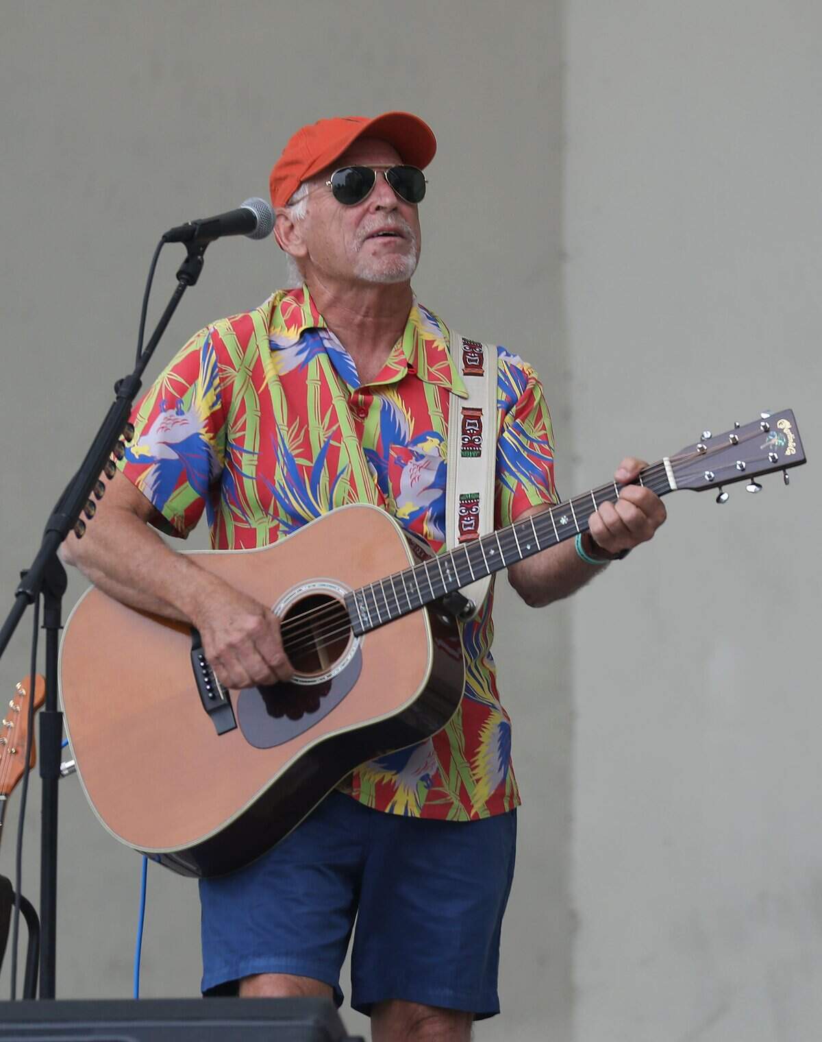 WEST PALM BEACH, FLORIDA - NOVEMBER 03: Jimmy Buffett plays a song as he performs at a Get Out the Vote rally for U.S. Senator Bill Nelson (D-FL) and Florida Democratic governor candidate Andrew Gillum at the Meyer Amphitheatre on November 03, 2018 in West Palm Beach, Florida. Mr. Buffett was encouraging people to vote for Sen. Nelson and Mayor Gillum who are in tight races against their Republican opponents. (Photo by Joe Raedle/Getty Images)