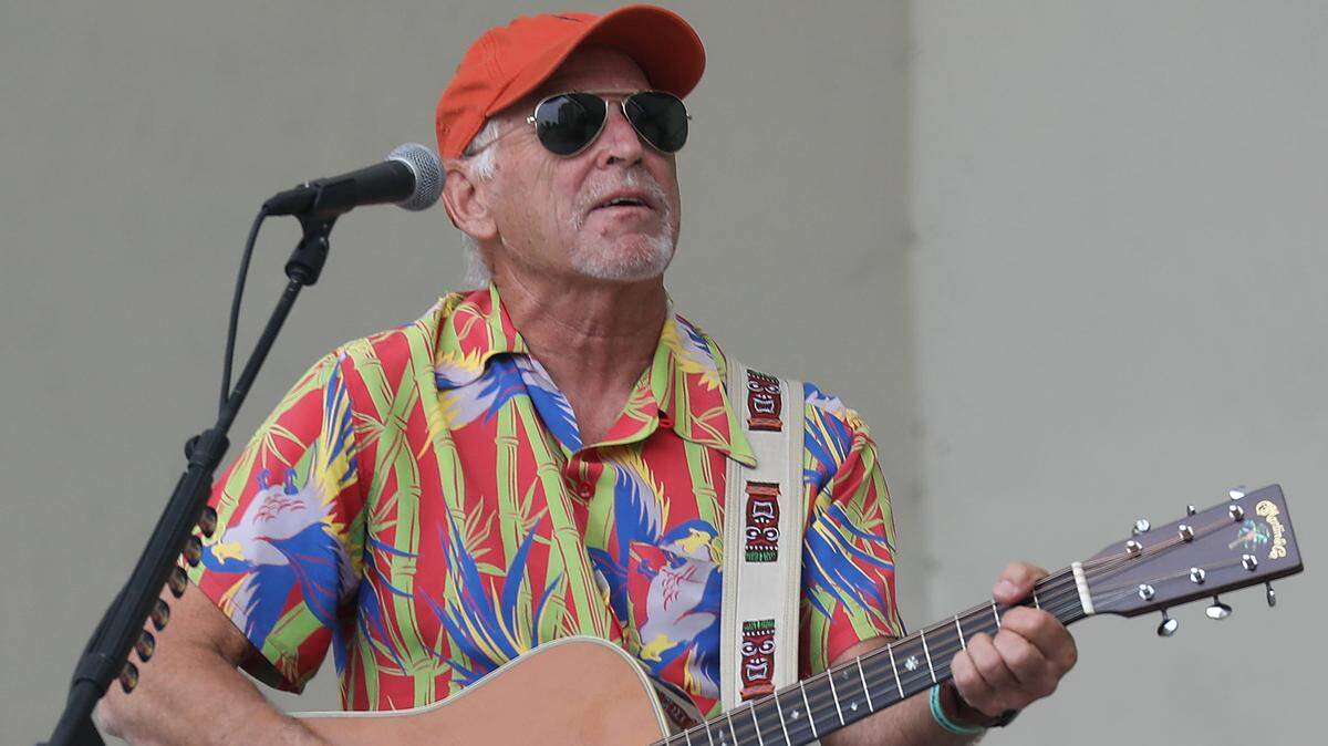 WEST PALM BEACH, FLORIDA - NOVEMBER 03: Jimmy Buffett plays a song as he performs at a Get Out the Vote rally for U.S. Senator Bill Nelson (D-FL) and Florida Democratic governor candidate Andrew Gillum at the Meyer Amphitheatre on November 03, 2018 in West Palm Beach, Florida. Mr. Buffett was encouraging people to vote for Sen. Nelson and Mayor Gillum who are in tight races against their Republican opponents. (Photo by Joe Raedle/Getty Images)