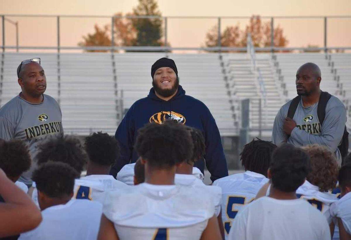 Greg Najee Grimes, center, works with Inderkum High School football players in 2021. Grimes, 31, a former football star at Boise State University who had returned home was shot and killed Monday, July 4, 2022, outside the Mix Downtown nightclub in Sacramento.