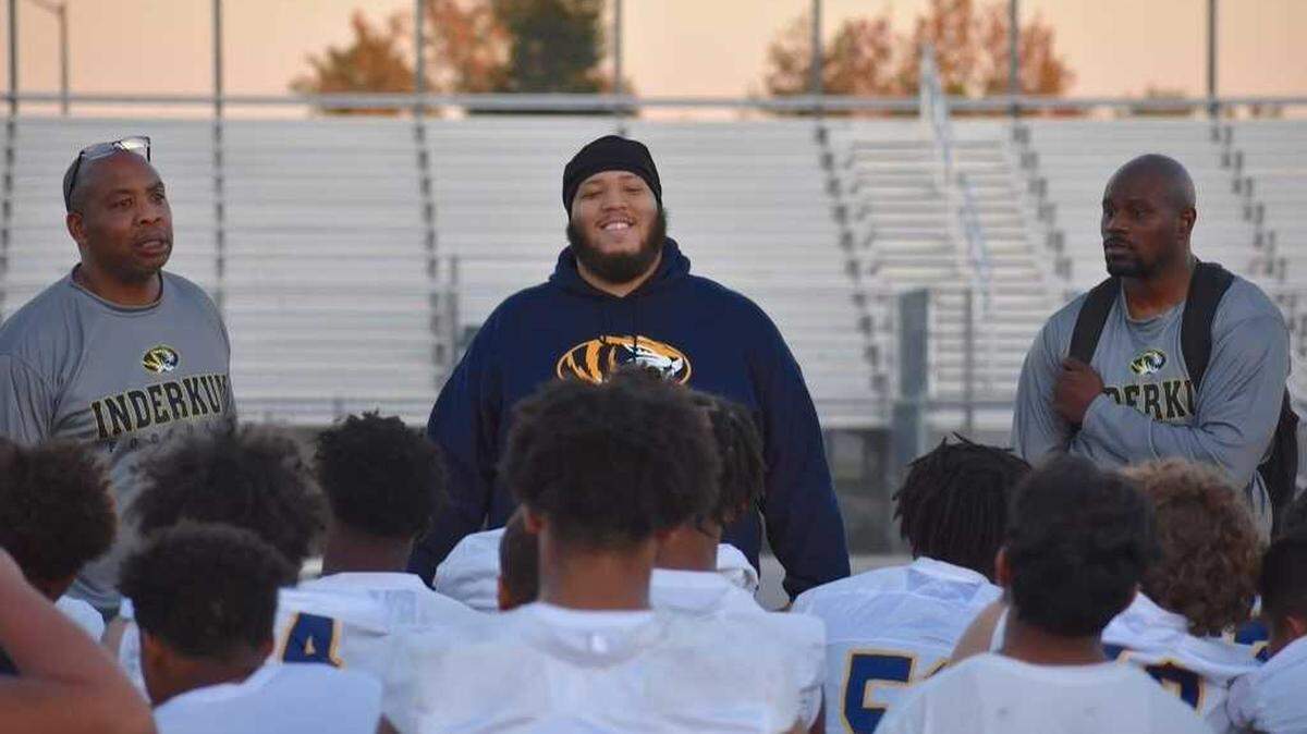 Greg Najee Grimes, center, works with Inderkum High School football players in 2021. Grimes, 31, a former football star at Boise State University who had returned home was shot and killed Monday outside the Mix Downtown nightclub in Sacramento.