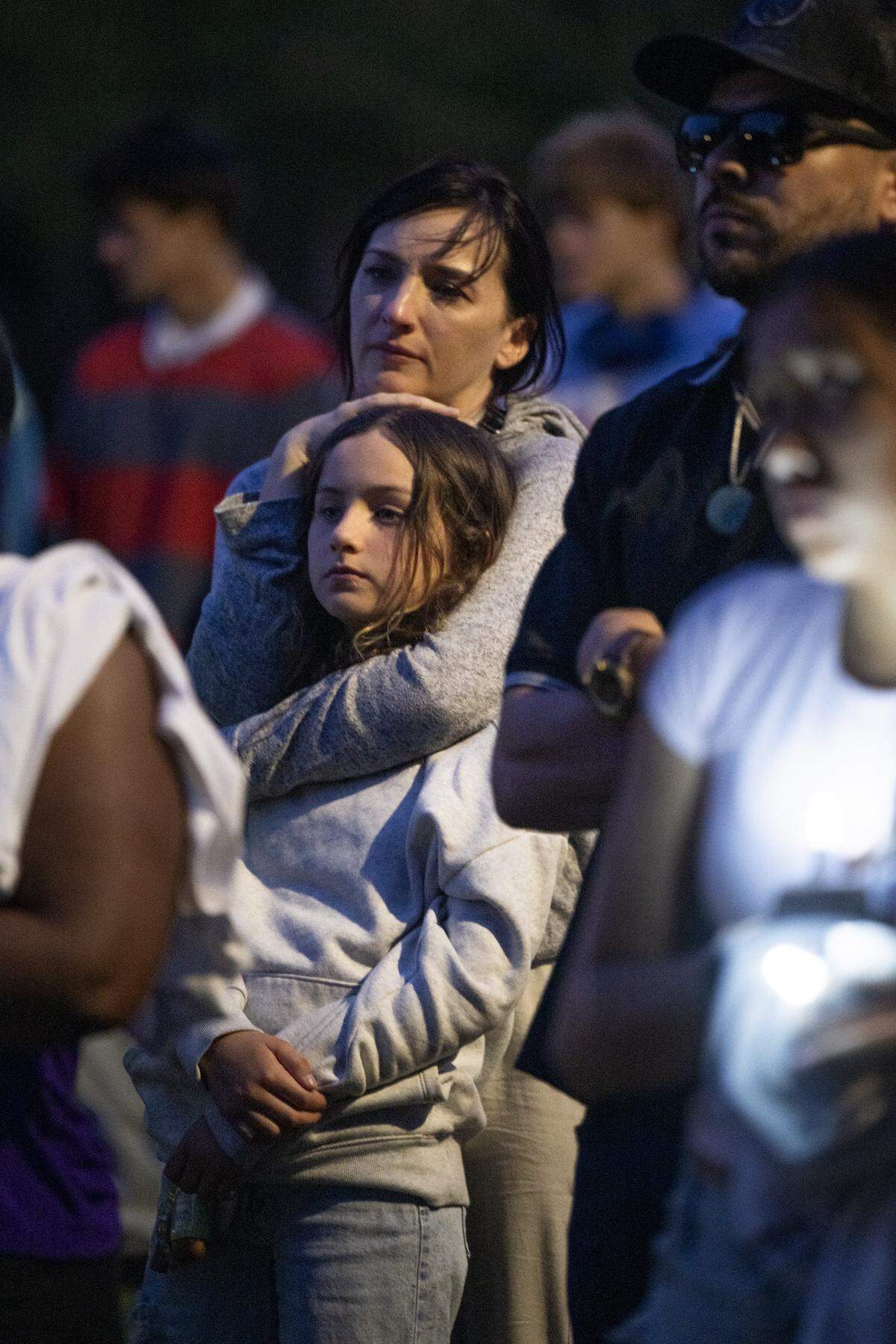 A candlelight vigil was held for Ariyonna Orozco, 16, and Piper Conkling, 14, at North Laguna Creek Park in Sacramento on Friday.