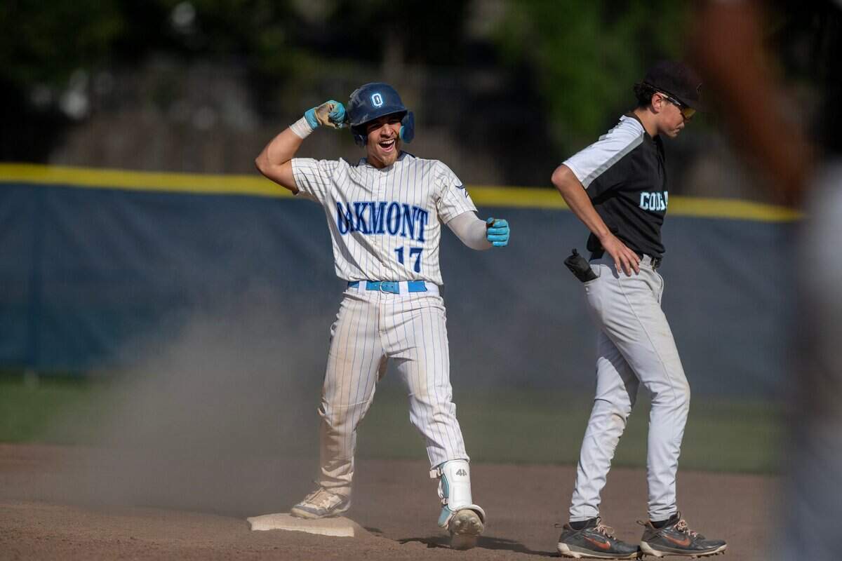 Oakmont baserunner Gabe Carrillo (17) celebrates after doubling to left center field in the CIF NorCal Baseball Division lll semifinal on Thursday in Roseville.