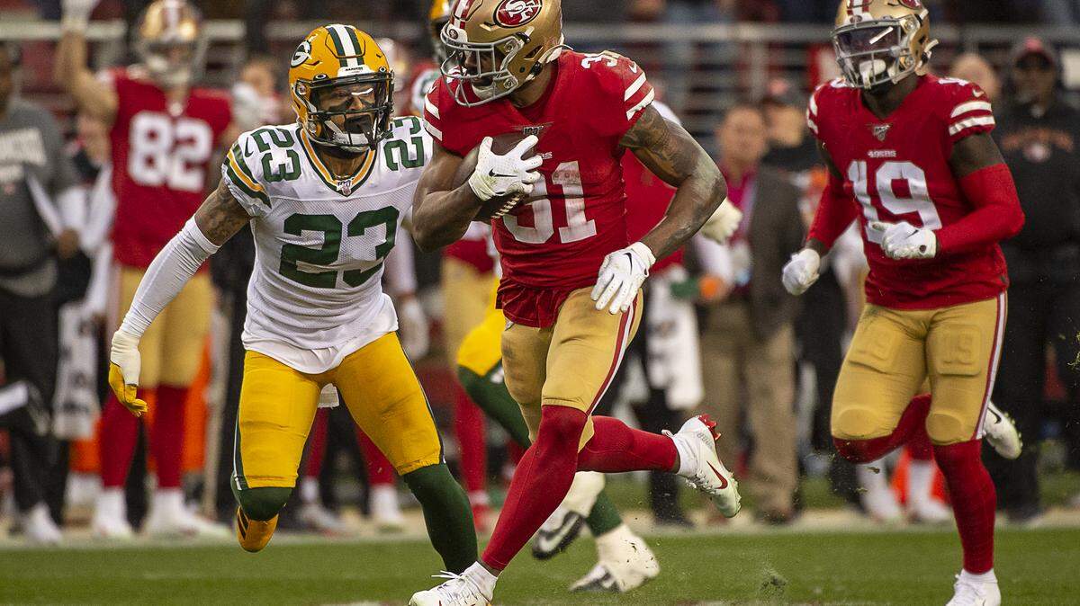 San Francisco 49ers running back Raheem Mostert (31) is chased by Green Bay Packers cornerback Jaire Alexander (23) in the second quarter during the NFC Championship game at the Levi’s Stadium on Sunday, Jan 19, 2020 in Santa Clara.