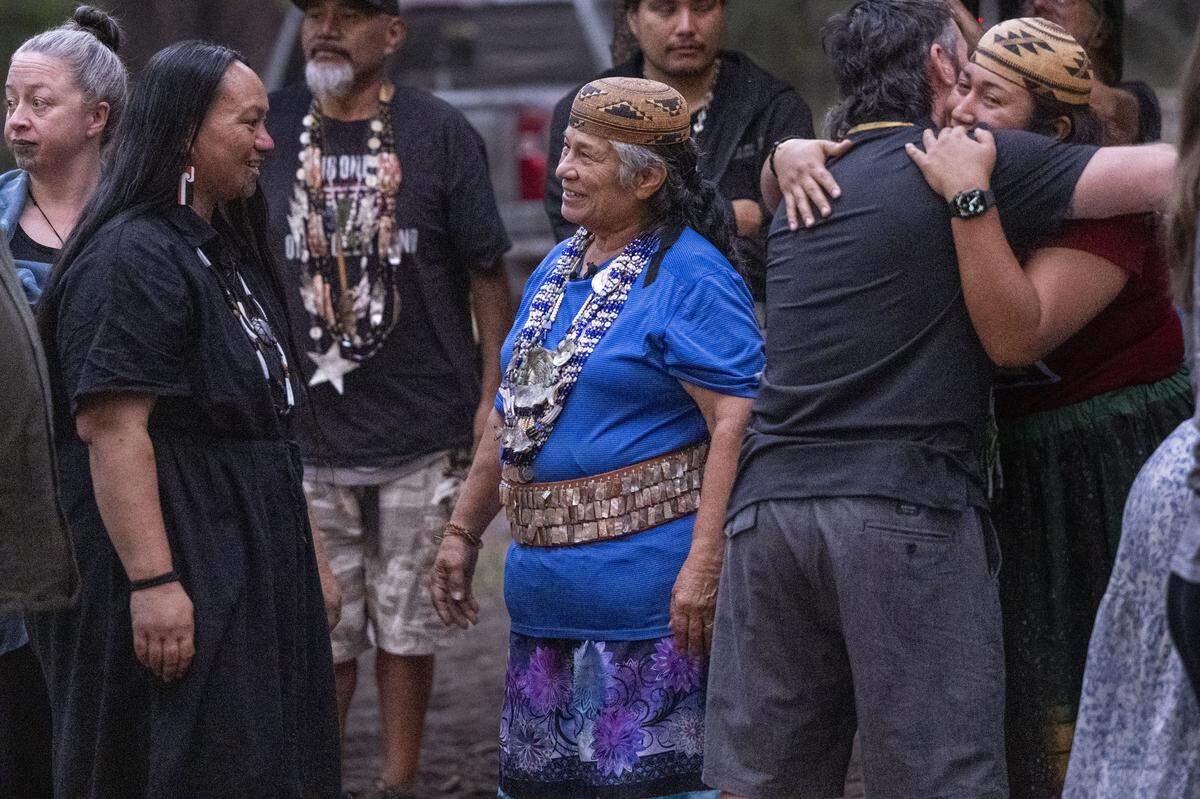 Winnemem Wintu Chief Caleen Sisk meets with a delegation of Maori people from New Zealand in Siskiyou County in August. A population of California salmon, believed to originate from the McCloud River, has thrived in New Zealand for over 100 years. 