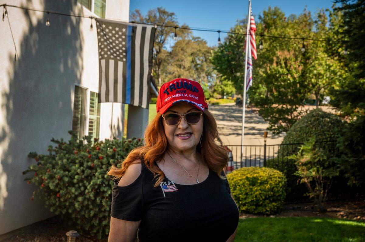 Linda Martinez-Hanna stands in her backyard in El Dorado Hills in October 2020. A first-generation Mexican American, her support for then President Trump was unpopular among her family and friends. “For me being a free thinker, I am disowned by family,” Martinez-Hanna said.