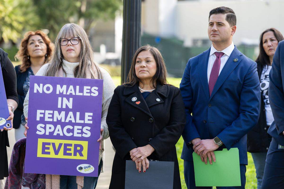 Assemblymembers Leticia Castillo, R-Corona, center, and Bill Essayli, R-Corona, joined anti-transgender activists during a press conference on Friday, Feb. 14, 2025, where they announced three new bills related to transgender issues.