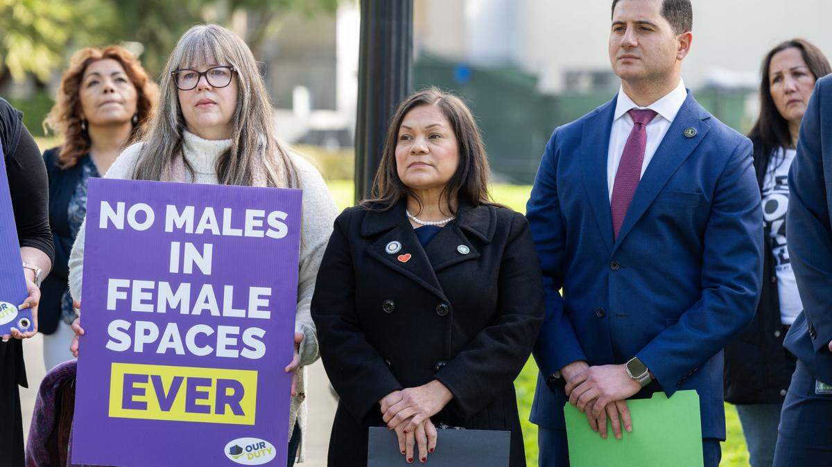 Assemblymembers Leticia Castillo, R-Corona, center, and Bill Essayli, R-Corona, joined anti-transgender activists during a press conference on Friday, Feb. 14, 2025, where they announced three new bills related to transgender issues that are now vexing Sacramento Democrats.