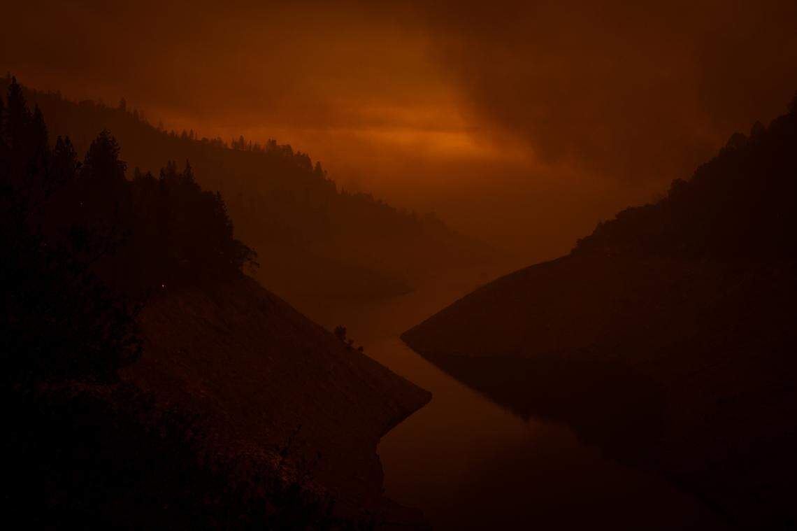 Smoke from the Bear Fire lingered over Lake Oroville in California on Wednesday, Sept. 9, 2020. Wildfires in California, Oregon and Washington state have killed seven people, with fears more have died in towns destroyed throughout the West.