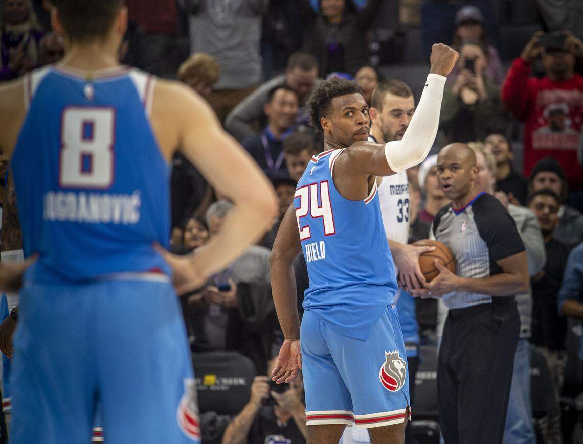 Sacramento Kings guard Buddy Hield (24) raises his fist as he prepares to shoot a free throw against the Memphis Grizzlies on Friday, Dec. 21, 2018 at the Golden 1 Center in Sacramento, California.