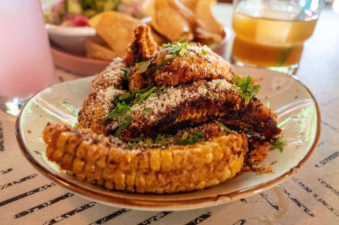 Elote ribs are available at Pig Latin in Elk Grove on Friday, July 19, 2024. Slices of corn cob is topped with brown sugar, Tajin, cojita cheese and cilantro.