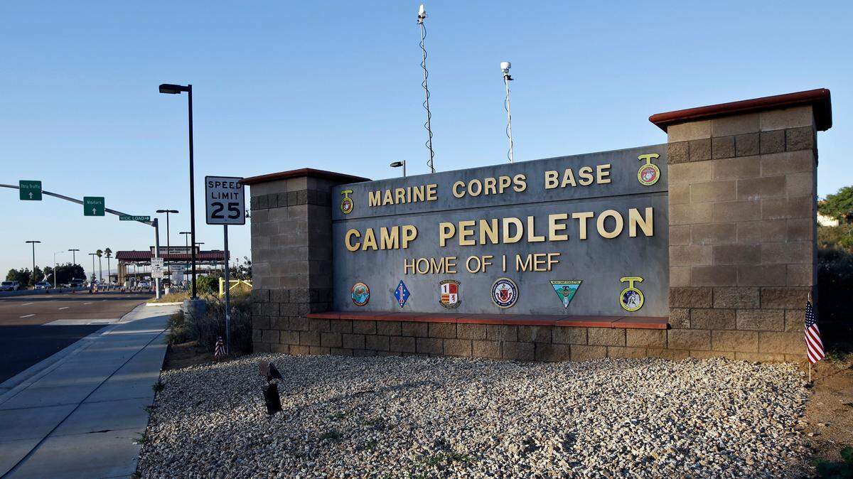 A 2013 file photo shows the main gate of Camp Pendleton Marine Base at Camp Pendleton, Calif. A new bill proposes to bar foreign governments from owning land within 50 miles of installations like this one. (AP Photo/Lenny Ignelzi, File)