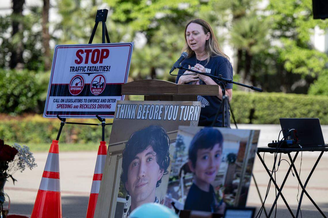 Allison Lyman speaks to a crowd of families and supporters with photographs of her son, Conner Lopez, a victim of vehicular violence, at a memorial rally at the California State Capitol on Thursday, April 23, 2026.