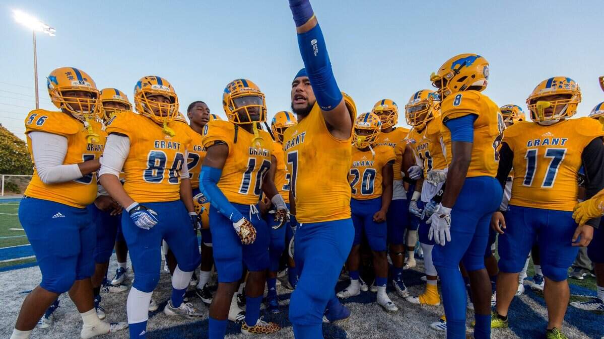 James Fotofili, center, fires up his Grant High teammates before a 2017 game against Capital Christian. Fotofili, now a linebacker at Nevada, underwent surgery after being injured in a road-rage incident in Sacramento.