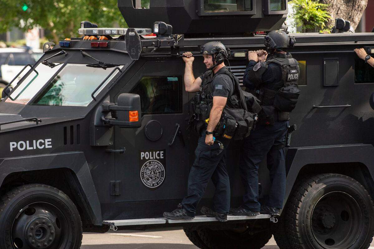Sacramento police ride on a BearCat armored personnel carrier at a shooting scene on La Riviera Drive in 2019. The incident ended with no one hurt and the surrender of the shooter.