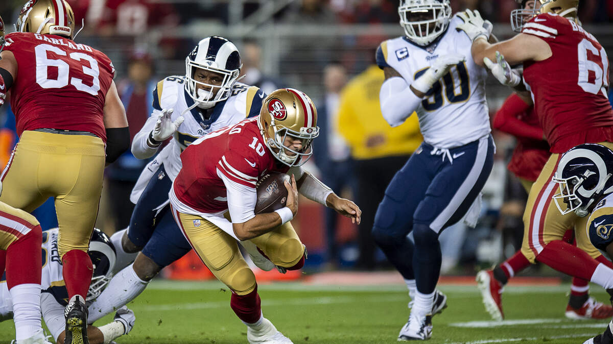 San Francisco 49ers quarterback Jimmy Garoppolo (10) is tackled by Los Angeles Rams linebacker Dante Fowler (56) in the first quarter during a game at Levi’s Stadium on Saturday, December 21, 2019 in Santa Clara, Calif.