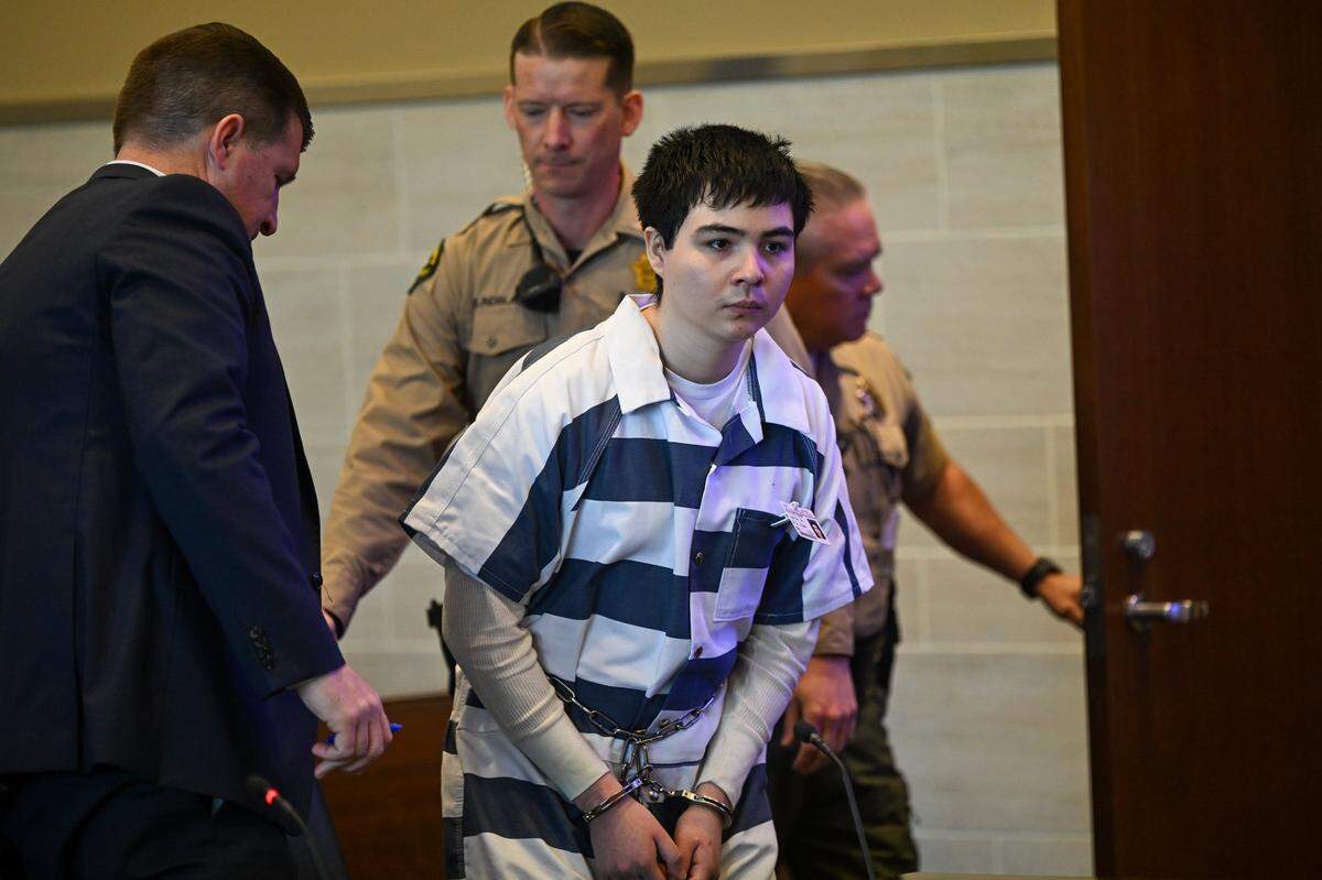 Carlos Reales Dominguez arrives with defense attorney Daniel Hutchinson, left, at Yolo Superior Court in Woodland on Monday. Prosecuting attorneys said they would not seek the death penalty for Dominguez, the suspect in a deadly Davis stabbing spree last spring.