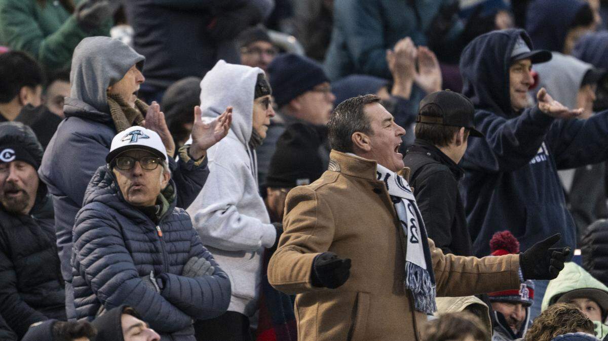 UC Davis fans react to a play during a NCAA FCS playoff quarterfinal against Illinois State at UC Davis Health Stadium on Saturday, Dec. 13, 2025.