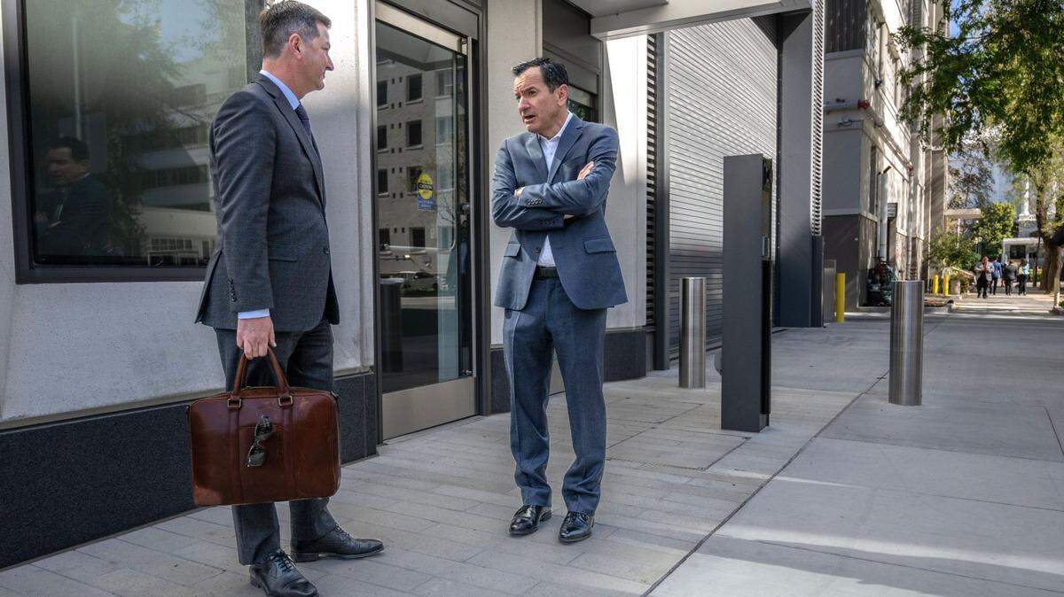 Assemblyman Chris Ward, D-San Diego, talks with Assembly Speaker Anthony Renton, D-Los Angeles, near the Legislative Office Building after the state Capitol building was cleared because of a “credible threat” on Thursday, April 7, 2023.