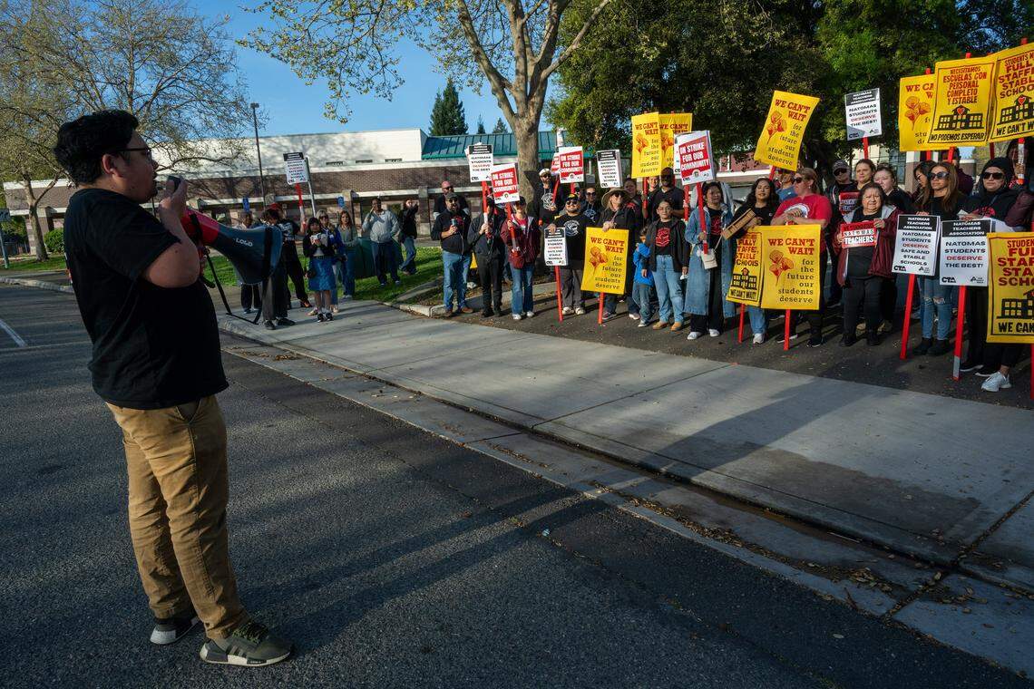 Nico Vaccaro, president of the Natomas Teachers Association, speaks to strikers in front of Natomas High School in Sacramento during the first strike at the Natomas Unified School District on Tuesday, March 10, 2026.
