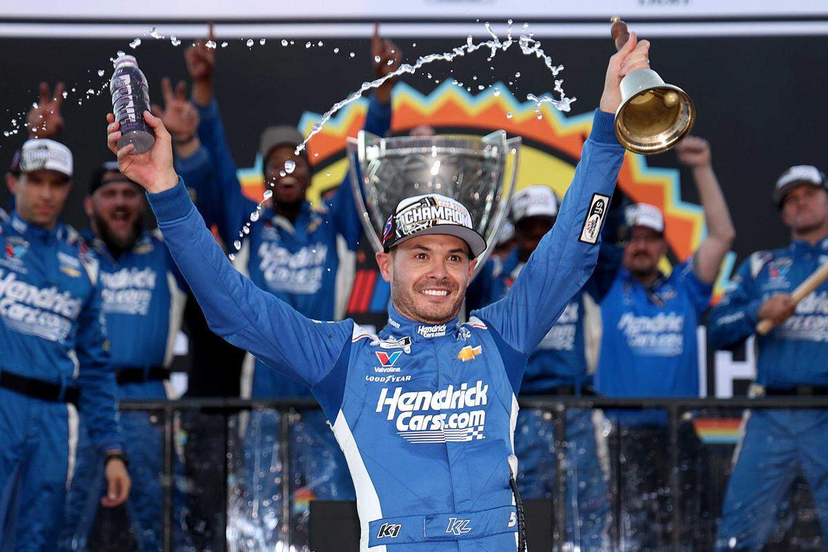 Kyle Larson, driver of the No. 5 HendrickCars.com Chevrolet, celebrates in victory lane after finishing first among the NASCAR Cup Series Championship drivers to win the Cup Series Championship at Phoenix Raceway on Sunday in Avondale, Ariz. The city of Elk Grove will honor the hometown racer with a parade on Nov. 14.