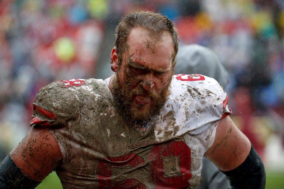 San Francisco offensive guard Mike Person walks on the sideline in the second half of the 49ers’ win over Washington.