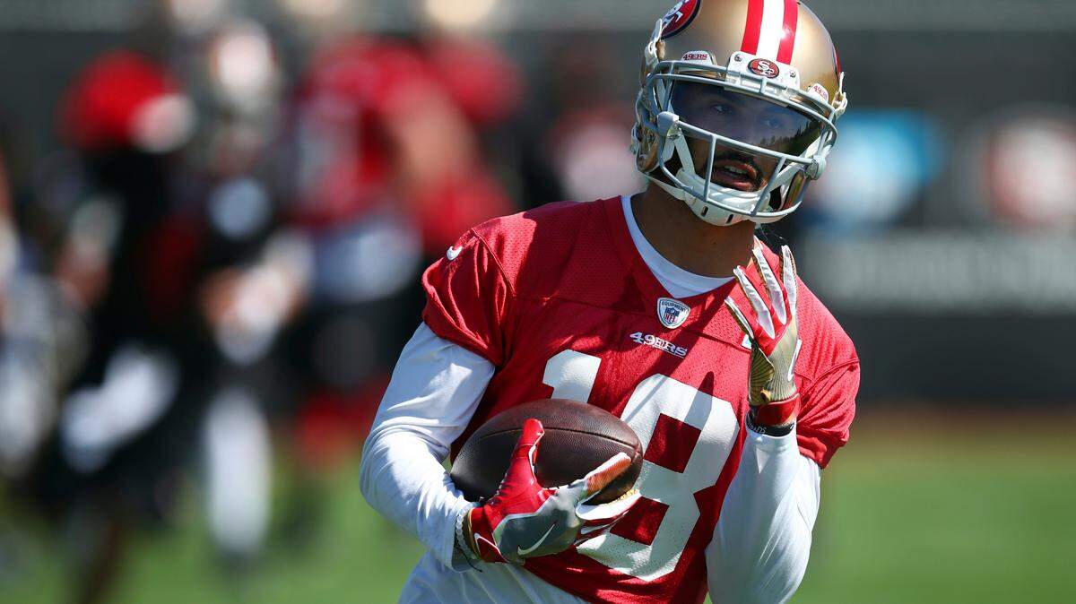 Dante Pettis, a rookie wide receiver for the 49ers, runs routes during training camp July 26 in Santa Clara.