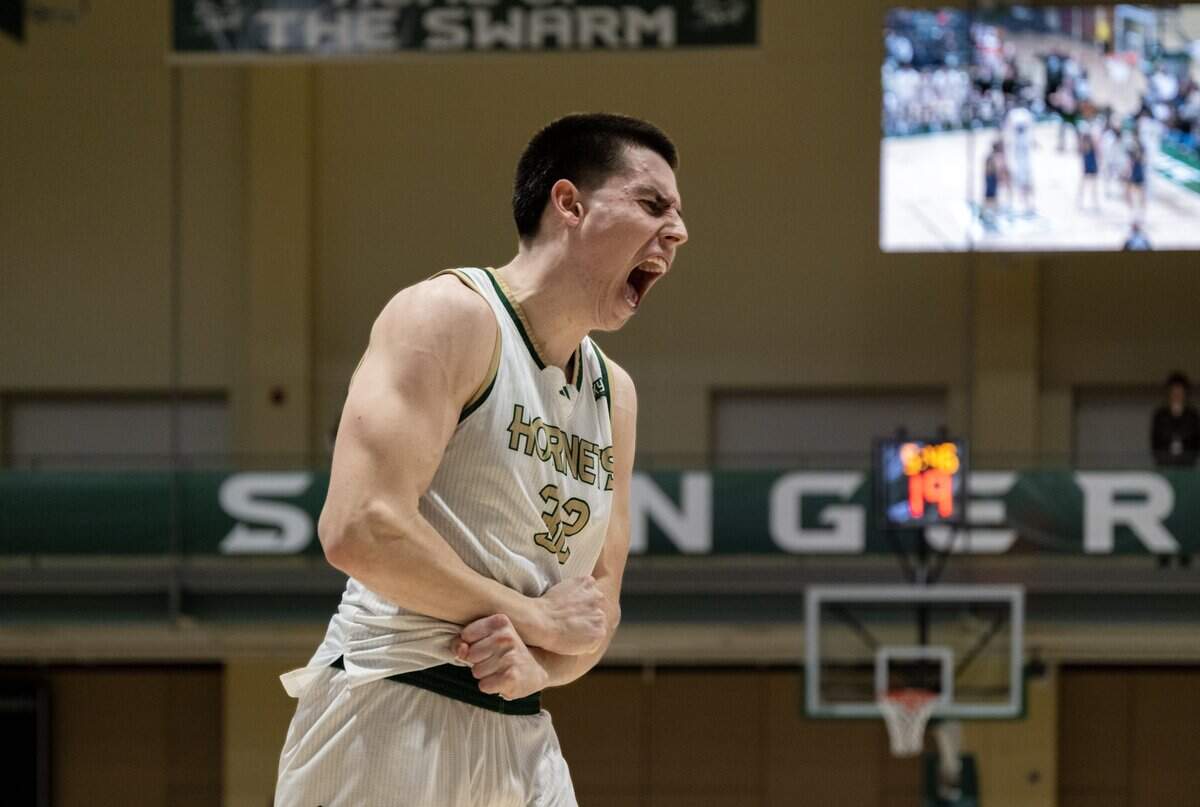 Sacramento State Hornets forward Mark Lavrenov (32) reacts after making a basket while being fouled in the second half of a game against the Northern Arizona Lumberjacks on Jan. 15 in Sacramento.
