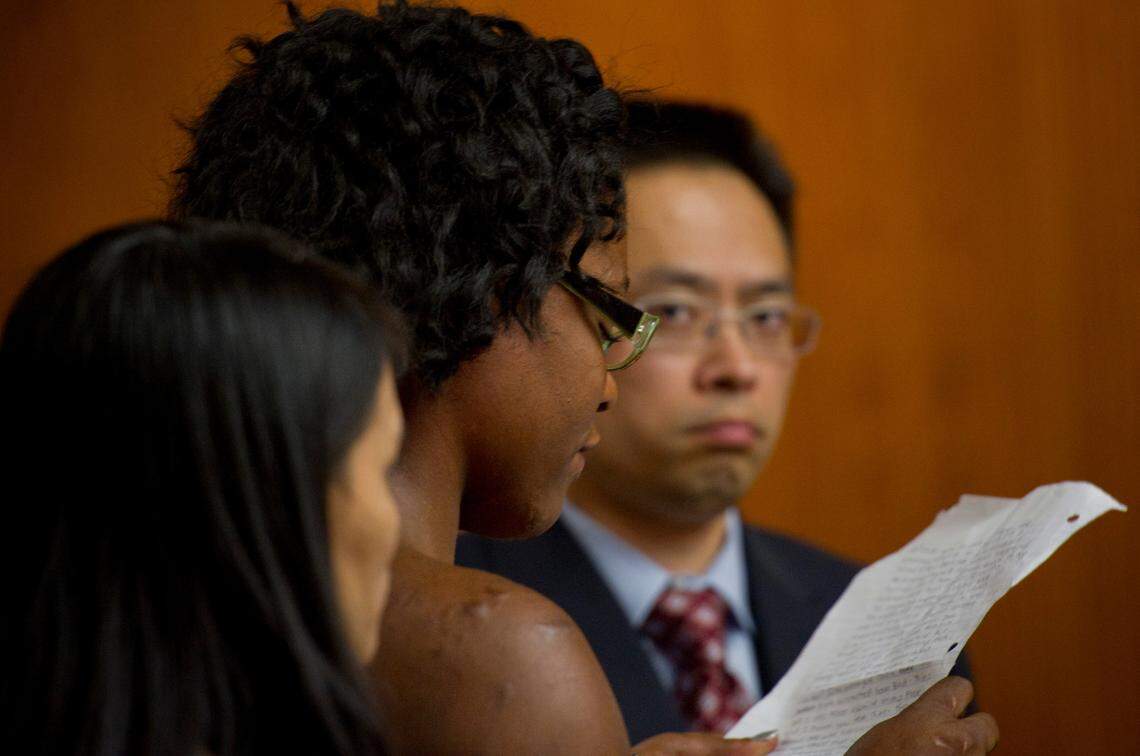 Lilly Manning, 19, speaks to great aunt Lillian Manning-Horvath, 72, at her sentencing hearing in Sacramento Superior Court in 2011, as Deputy District Attorney Thien Ho, the prosecutor in the case, looks on. Lilly’s abuser received consecutive life terms with no chance of parole for her no-contest pleas to charges of torture and mayhem.