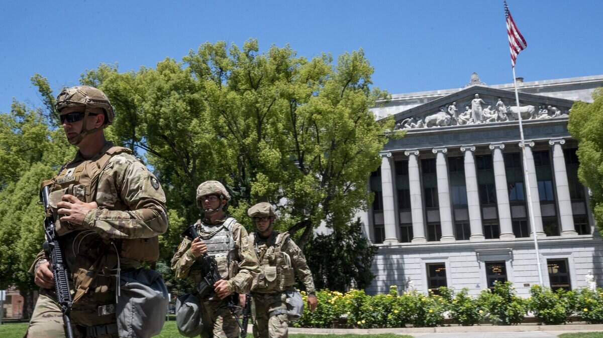 California National Guard patrol in front of the California State Treasure’s Office in Sacramento on Tuesday, June 2, 2020.