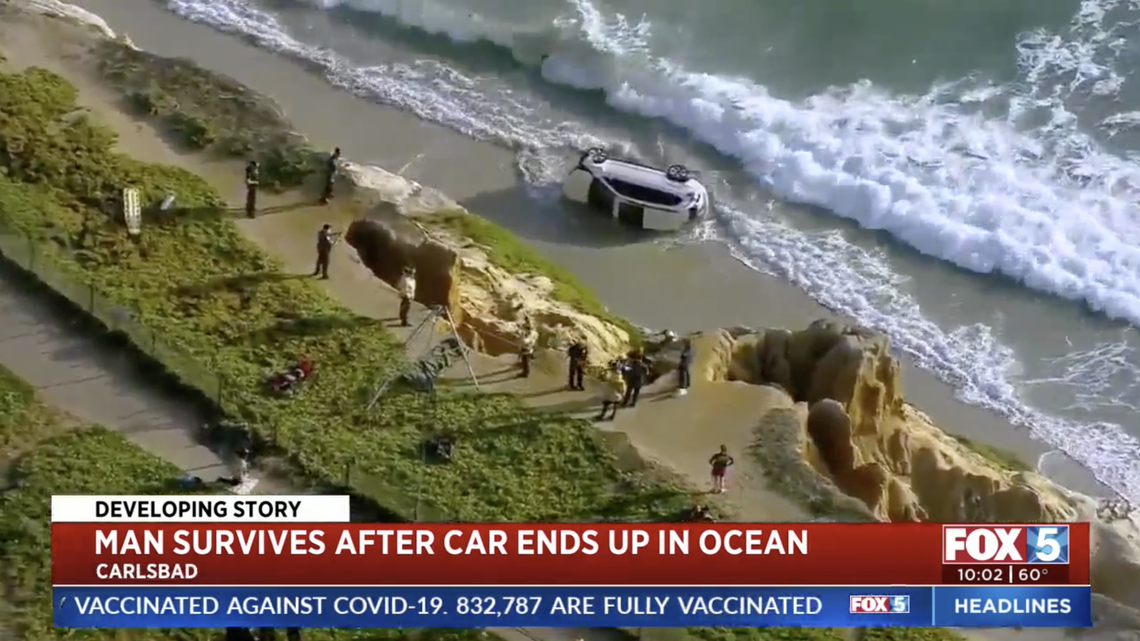 A man was hospitalized after driving his SUV through a guardrail and over a cliff onto South Carlsbad State Beach, according to the Carlsbad Fire Department.