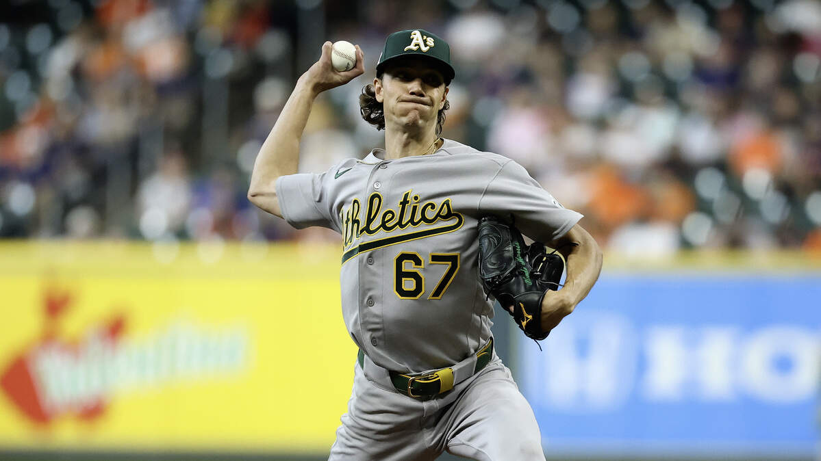 Kade Morris of the Athletics pitches in his MLB debut against the Houston Astros during the first inning at Daikin Park on Saturday in Houston. Morris was sent back down to Triple-A on Tuesday after giving up nine runs in his debut.