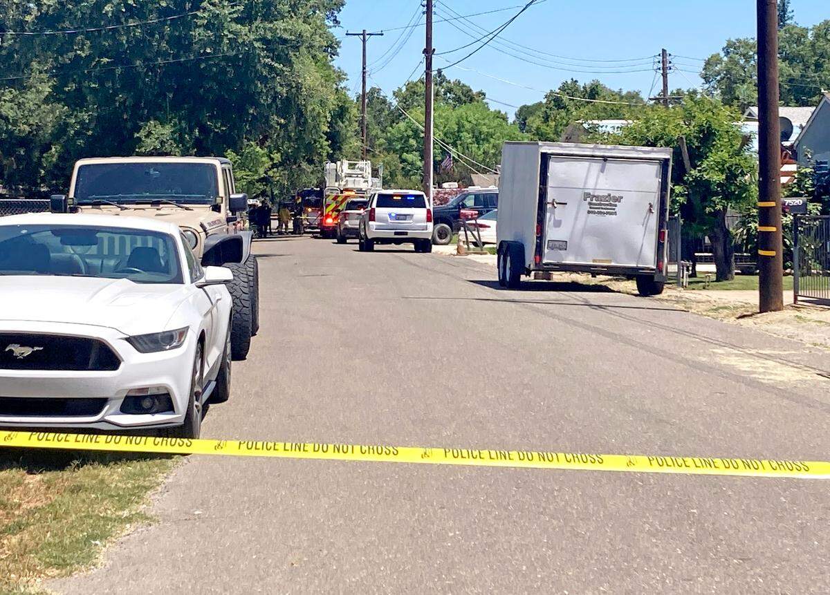 Police tape blocks access to Oak Grove Avenue in Citrus Heights, where fire officials found a body inside burning home on Friday, June 7, 2024.