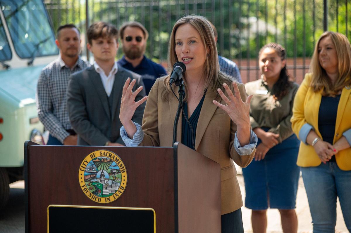 Sacramento Councilmember Caity Maple, seen speaking at an event in June, has pushed for faster road-safety projects amid a rising traffic death toll in the city.