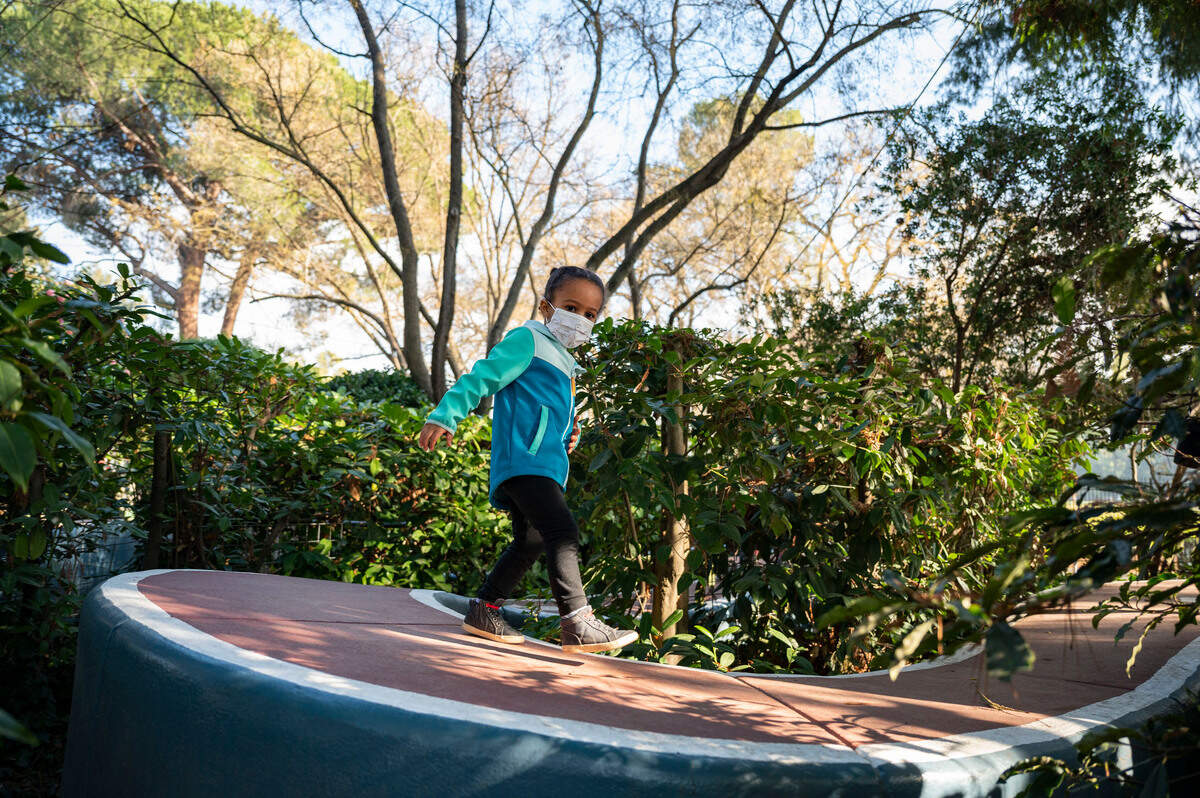 Belle James, almost 3, explores the Crooked Mile for the first time at Fairytale Town in Sacramento on Thursday, Jan. 14, the day park reopened after being closing for weeks because of the coronavirus stay-at-home order.