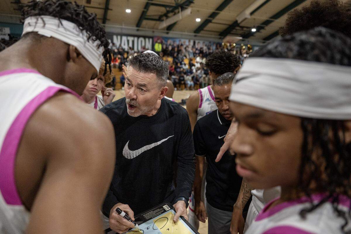 Sheldon Huskies head coach Joey Rollings diagrams a play during a timeout against the Monterey Trail Mustangs on Wednesday.
