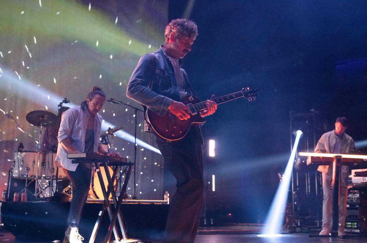 Sacramento band Tycho performs during the opening weekend for Channel 24, a new concert venue in midtown, on Friday. The band is led by Scott Hansen on the synthesizers, right, and features guitarist Zac Brown, center, keyboardist Billy Kim, left, and drummer Rory O’Connor.