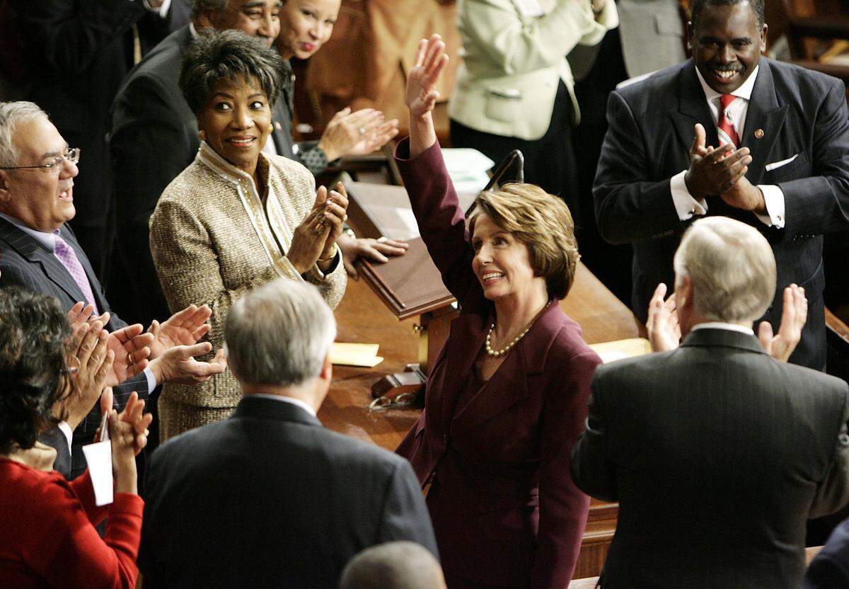 Nancy Pelosi, D-Calif., waves to colleagues before becoming the first female Speaker of the House during a swearing in ceremony for the 110th Congress in the House Chamber of the U.S. Capitol on Jan. 4, 2007, in Washington, D.C. 